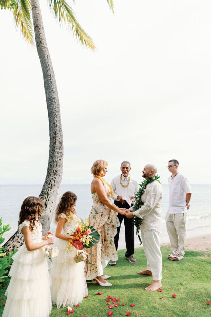 intimate vow renewal in hawaii with a family